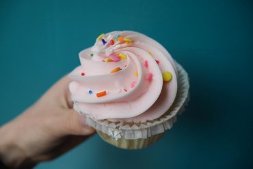 pink desserts nyc - amys bread yellow cupcake with pink frosting