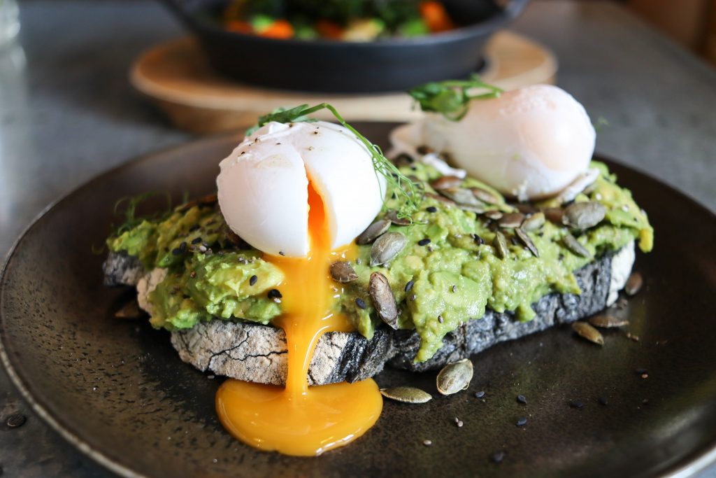 smashed avocado on charcoal sourdough - The Farmer's Mistress London